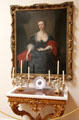 Portrait over console table & candelabras at Rienzi house museum. Houston, TX.