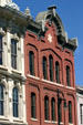 Red brick 206 East 6th St. with six point star. Austin, TX.