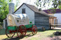 Covered wagon at Sauer-Beckmann Farmstead of Lyndon B. Johnson State Park. Stonewall, TX.