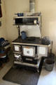 Cast-iron wood stove by Heartland of Kitchener, ON at Sauer-Beckmann Farmstead. Stonewall, TX.