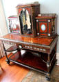 Display table with cabinets in study at Neill-Cochran House Museum. Austin, TX.