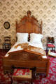 Carved Eastlake bedstead at Neill-Cochran House Museum. Austin, TX.
