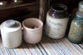 Stoneware crocks at Pioneer Village. Gonzales, TX.