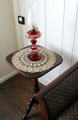Pedestal base walnut table by Johann Jahn at Museum of Texas Handmade Furniture. New Braunfels, TX.