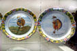 French ceramic plates depicting early flights of Bernier & flying man Godwin at National Air & Space Museum. Chantilly, VA.