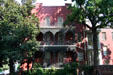 Townhouse with cast iron grillwork on porches near VCU. Richmond, VA.