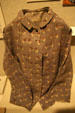 Shirt worn by nurse with crossed Confederate flags at Chimborazo Medical Museum. Richmond, VA.
