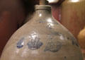 Stoneware jug incised with sailing ships by Luman Norton Pottery of Bennington, VT at Bennington Museum. Bennington, VT.