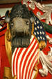 Carved buffalo supports driver's seat on Pawnee Bill Wild West show bandwagon at Circus World Museum. Baraboo, WI.