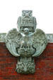 Sculpted eagle atop Farmer's & Merchant's Union Bank. Columbus, WI.