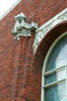Sullivan brickwork & capital on side of Farmer's & Merchant's Union Bank. Columbus, WI.