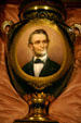 Commemorative Royal Vienna Porcelain vase with portrait of Abraham Lincoln painted by Rob Pilz at Wisconsin Veterans Museum. Madison, WI.