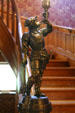 Brass knight lamp on newel post of Laramie Plains Museum. Laramie, WY.