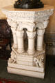 Sculpted lamp table being supported by pillars at Penrhyn Castle. Bangor, Wales.