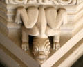 Detail of figure on sculpted lamp table at Penrhyn Castle. Bangor, Wales.