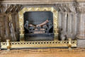 Stone fireplace with zigzag surround in Library at Penrhyn Castle. Bangor, Wales.