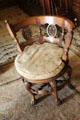 Claw foot carved wooden chair designed by Thomas Hopper in Library at Penrhyn Castle. Bangor, Wales.