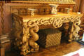 Wall table with ornately sculpted mythical beasts on front in Drawing Room at Penrhyn Castle. Bangor, Wales.