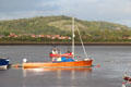 Sailboat moored in Conwy harbor. Conwy, Wales.