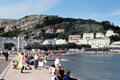 Visitors enjoying the sunshine at Colwyn Bay in North Wales.