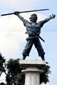 Liberation monument of fighter with gun & kris. Bali, Indonesia.