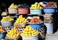 Citrus fruits & brown salak fruit at street stand. Bali, Indonesia.