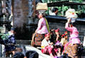 Carrying offerings up to temple. Bali, Indonesia.